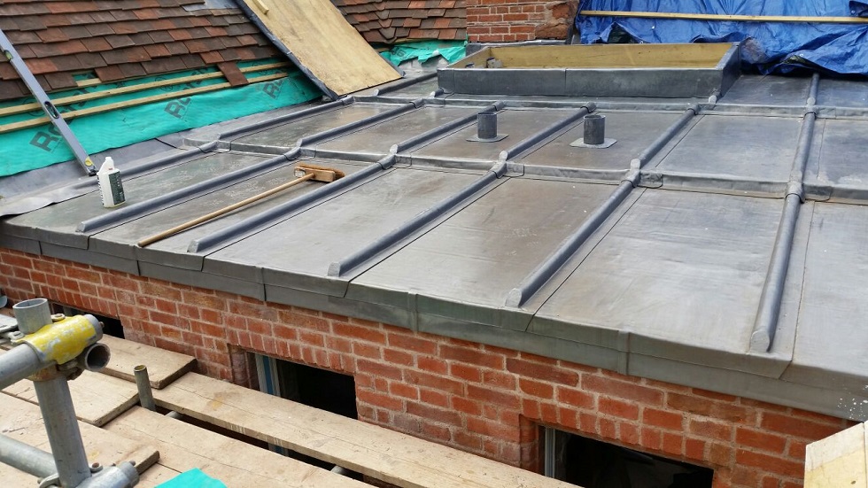 Lead flat roof with two chimneys